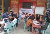 Suasana balai Desa Pasuruan, Kecamatan Penengahan, Lampung Selatan, saat mengikuti Pengabdian kepada Masyarakat (PkM) Jurusan Agribisnis Fakultas Pertanian Universitas Lampung (Unila).(Foto:ist)