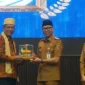Menteri Hukum Supratman Andi Agtas bersama Gubernur Lampung Rahmad Mirzani Djausal dan Wagub Lampung Jihan Nurlela saat meresmikan ribuan Posbakum Desa di Lampung. (Foto: ist)